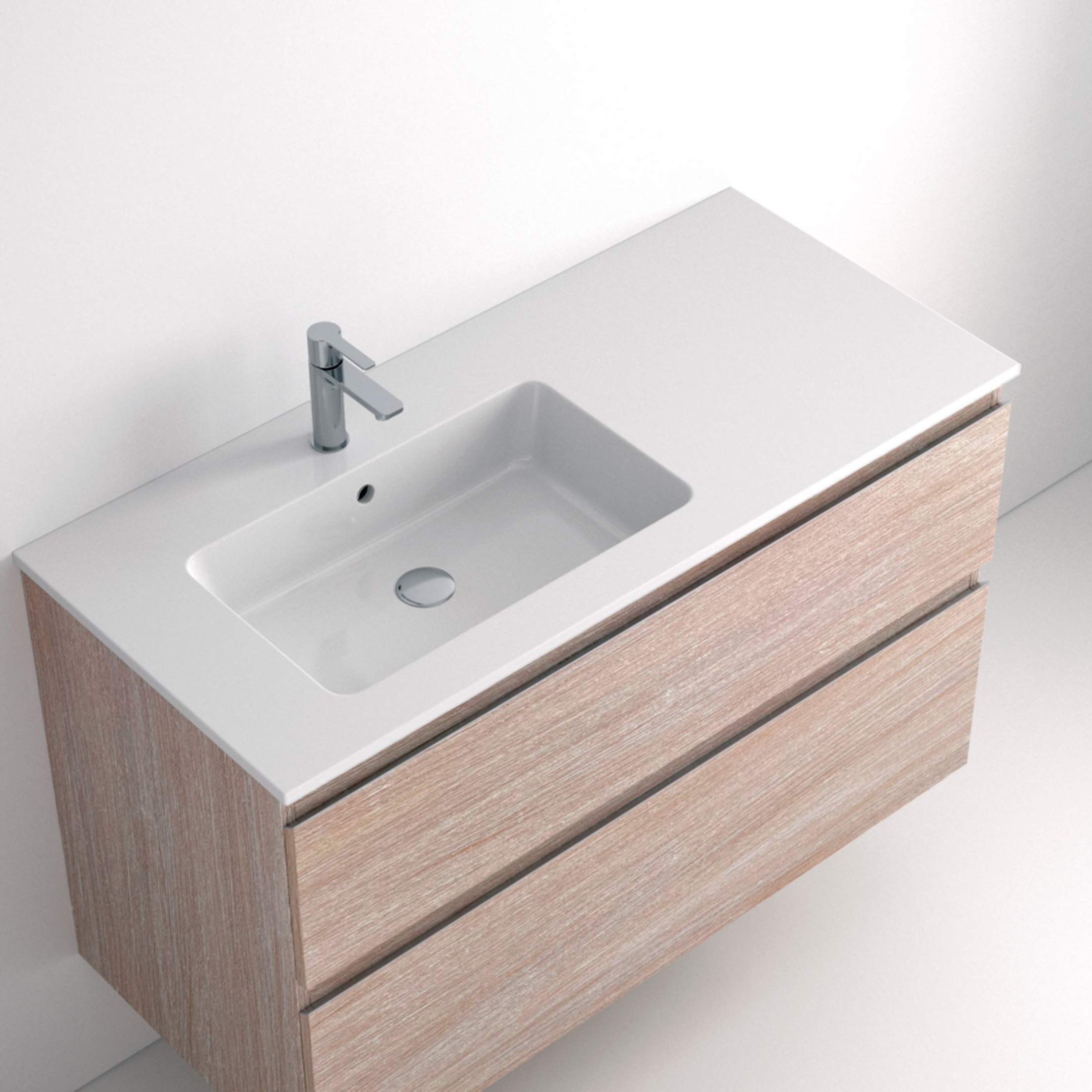 Lavabo Solido Seno Desplazado El Lavabo Solido Seno Desplazado destaca por su diseño funcional y adaptable, ideal para optimizar el espacio en el baño. Fabricado en Solid Surface, este modelo ofrece una superficie continua, resistente y de fácil limpieza. Su seno desplazado, disponible a izquierda o derecha, permite mayor área de apoyo y se adapta perfectamente a distintas distribuciones. Con acabado en brillo y fondo de 46 cm.