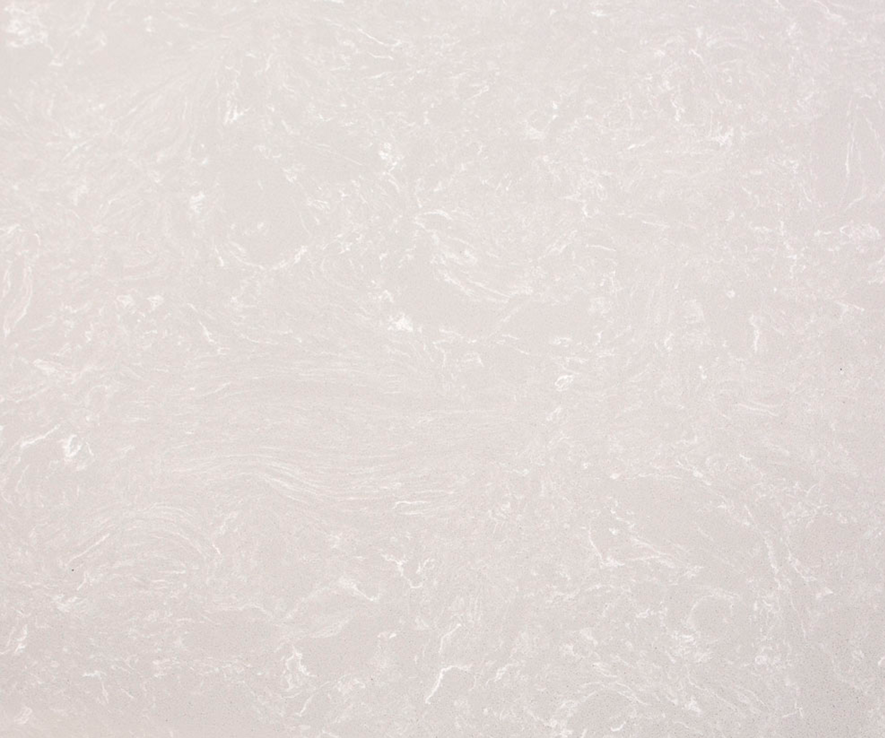 Encimera de piedra compacta en acabado Gris Polar, tono gris claro con textura uniforme.