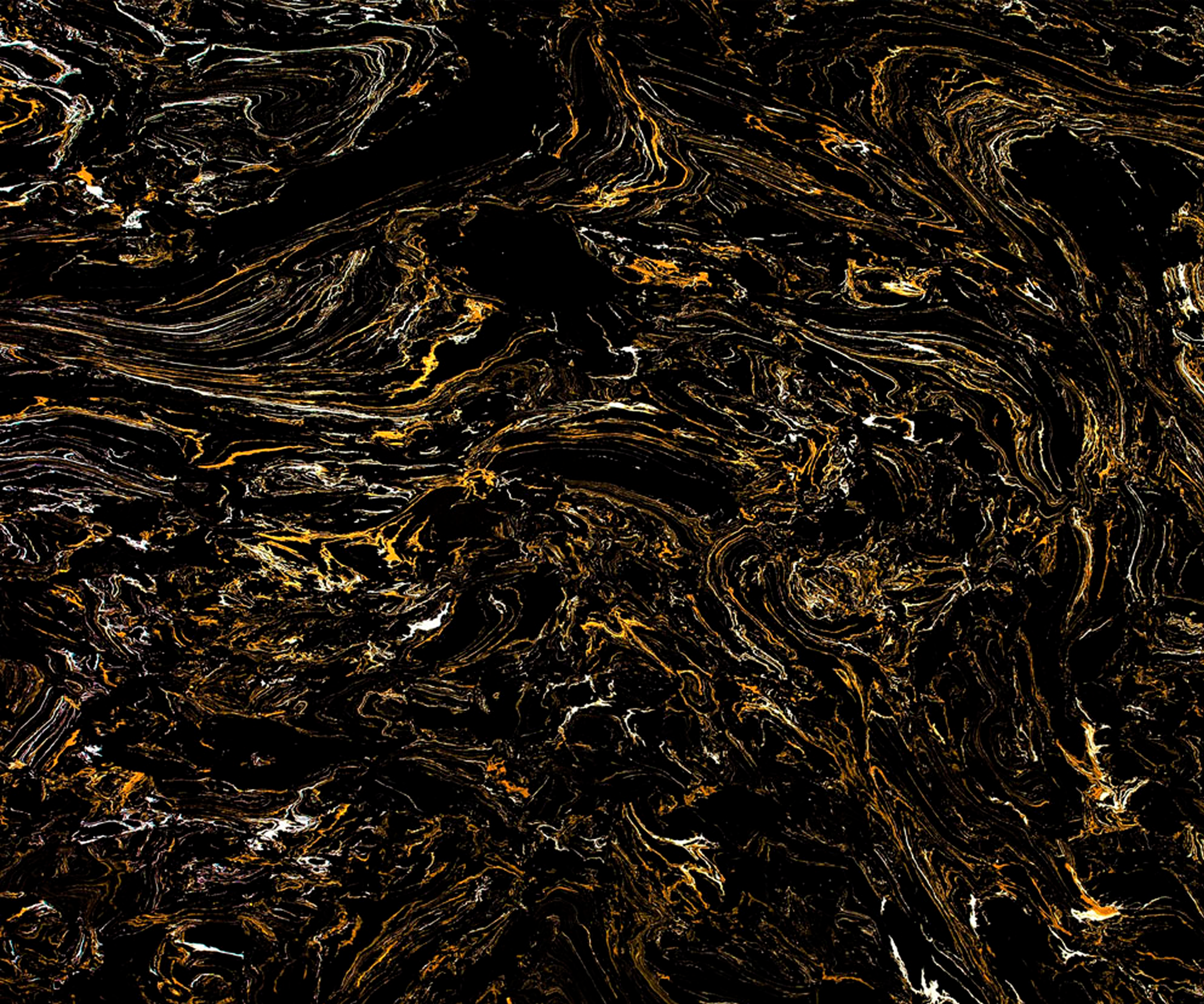 Encimera de piedra compacta en acabado Portoro, negro intenso con vetas doradas.