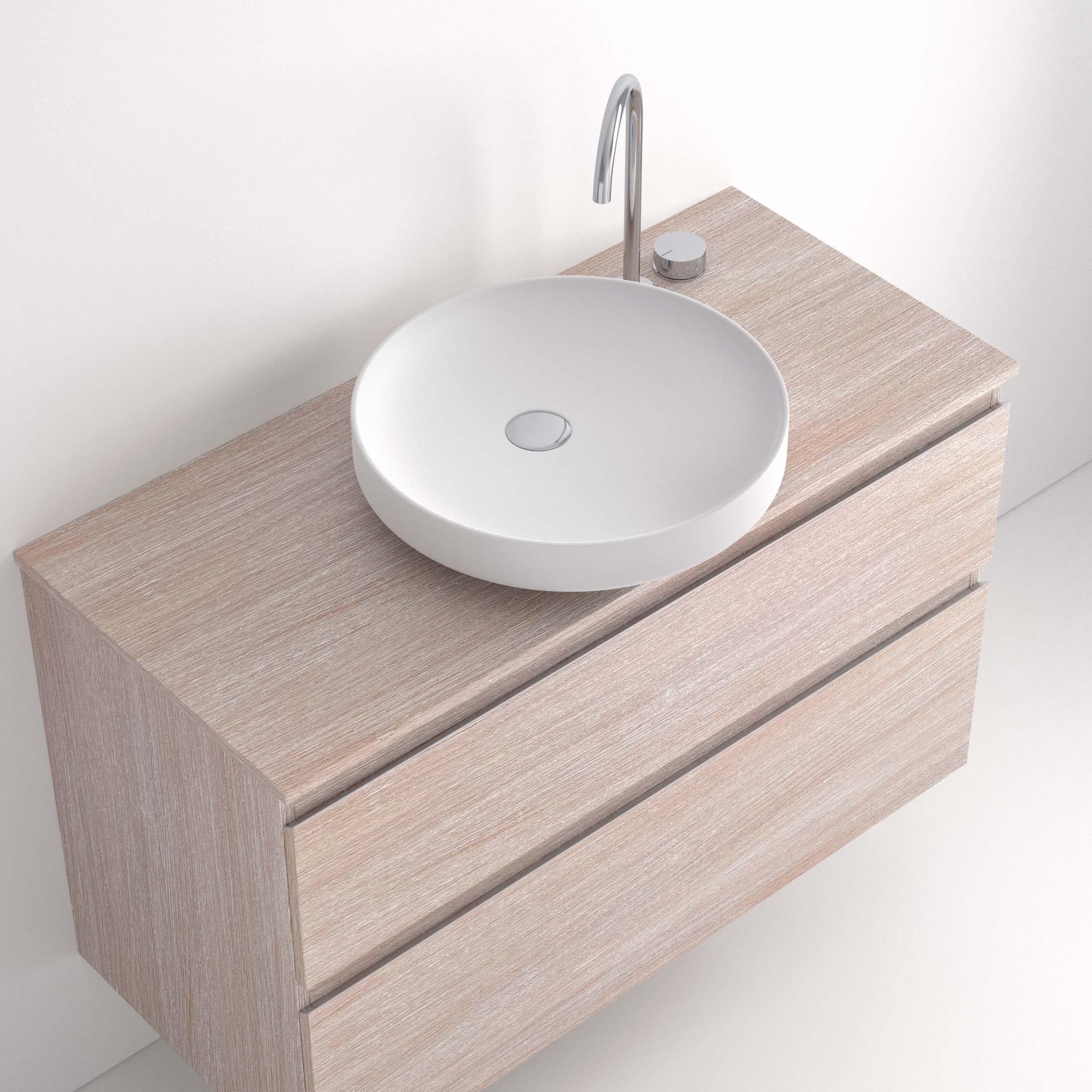 Lavabo Bol El Lavabo Bol es una pieza única que transforma cualquier baño en un espacio sofisticado. Con su forma redonda tipo cuenco y su acabado en brillo, este lavabo de sobre encimera se convierte en el centro de atención gracias a su diseño minimalista y elegante. Fabricado con porcelana de alta calidad combina perfectamente con estilos de baño modernos, nórdicos o contemporáneos. Su diseño ergonómico no solo aporta estética, sino también funcionalidad en el día a día. Ideal para quienes buscan un lavabo moderno y distintivo que aporte personalidad al baño.